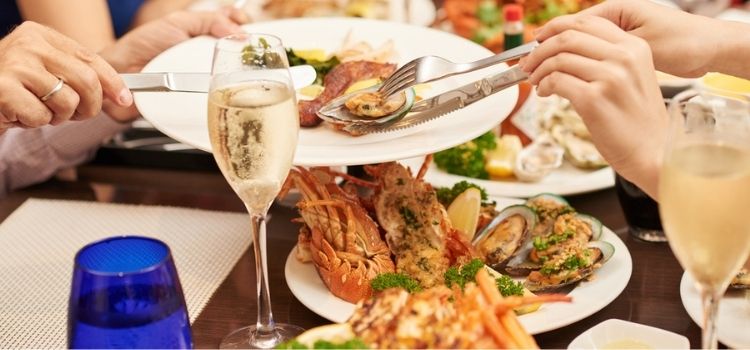 plates of seafood served at a group dinner