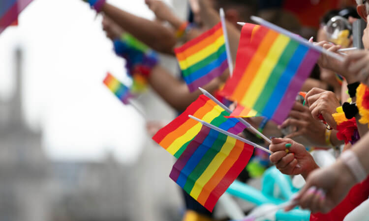close up of LGBTQ pride flags at a parade